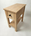 Wooden side table with a drawer on a white background