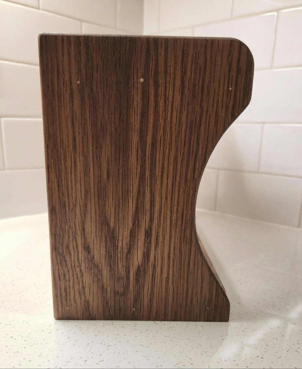 Handmade oak kitchen shelf styled with plants and mugs, natural wood finish